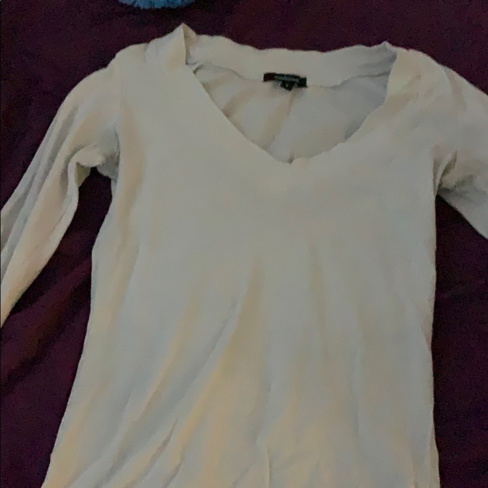 White vee neck shirt